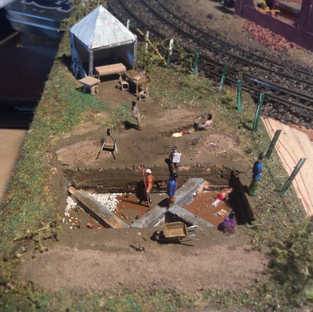'Time Team' are digging up this layout! Tools and wheelbarrows from the N21 kit, by Paul Harding-Mabbs.\\n\\n28/02/2022 10:01